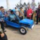 Bupati Sergai H. Darma Wijaya melakukan test drive mobil listrik karya SMK N 1 Dolokmasihul. Waspada/Darmawan