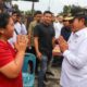 PJ Gubsu Hassanudin, menyapa masyarakat saat menunjau salah satu TPS. Waspada/Ist
