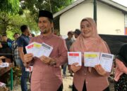 Syakir-Yulia Gunakan Hak Pilih Di TPS 001 Desa Kutacane Lama