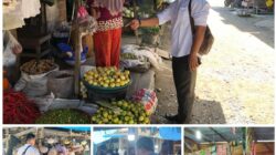 Warga melihat dan membeli harga beras murah di Pasar Simpang Peut Nagan Raya, Kamis (29/2).(Waspada/Muji Burrahman)