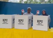 Pj Bupati Aceh Utara Nyoblos Di TPS 001 Kuta Lhoksukon