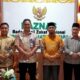 KETUA Baznas Sumut Prof. Dr. H. Mohammad Hatta bersama wakil poto bersama Kadisnaker Kota Medan Illyan Chandra Simbolon usai pertemuan. Waspada/ist