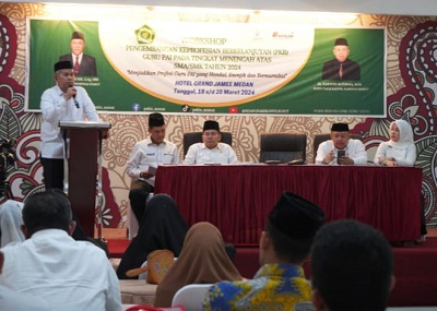 KEPALA Bidang Pendidikan Agama dan Keagamaan Islam Dr. H. Muksin Batubara, M.Pd saat membuka kegiatan. Waspada/ist