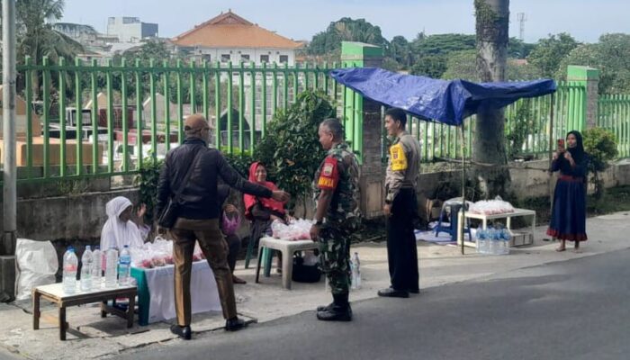 Bhabinkamtibmas Imbau Pedagang Musiman Dekat Pekuburan Islam