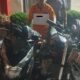 Tersangka penadah kereta hasil curian, H, diamankan bersama barang bukti dua sepeda motor. (Waspada/Ist)