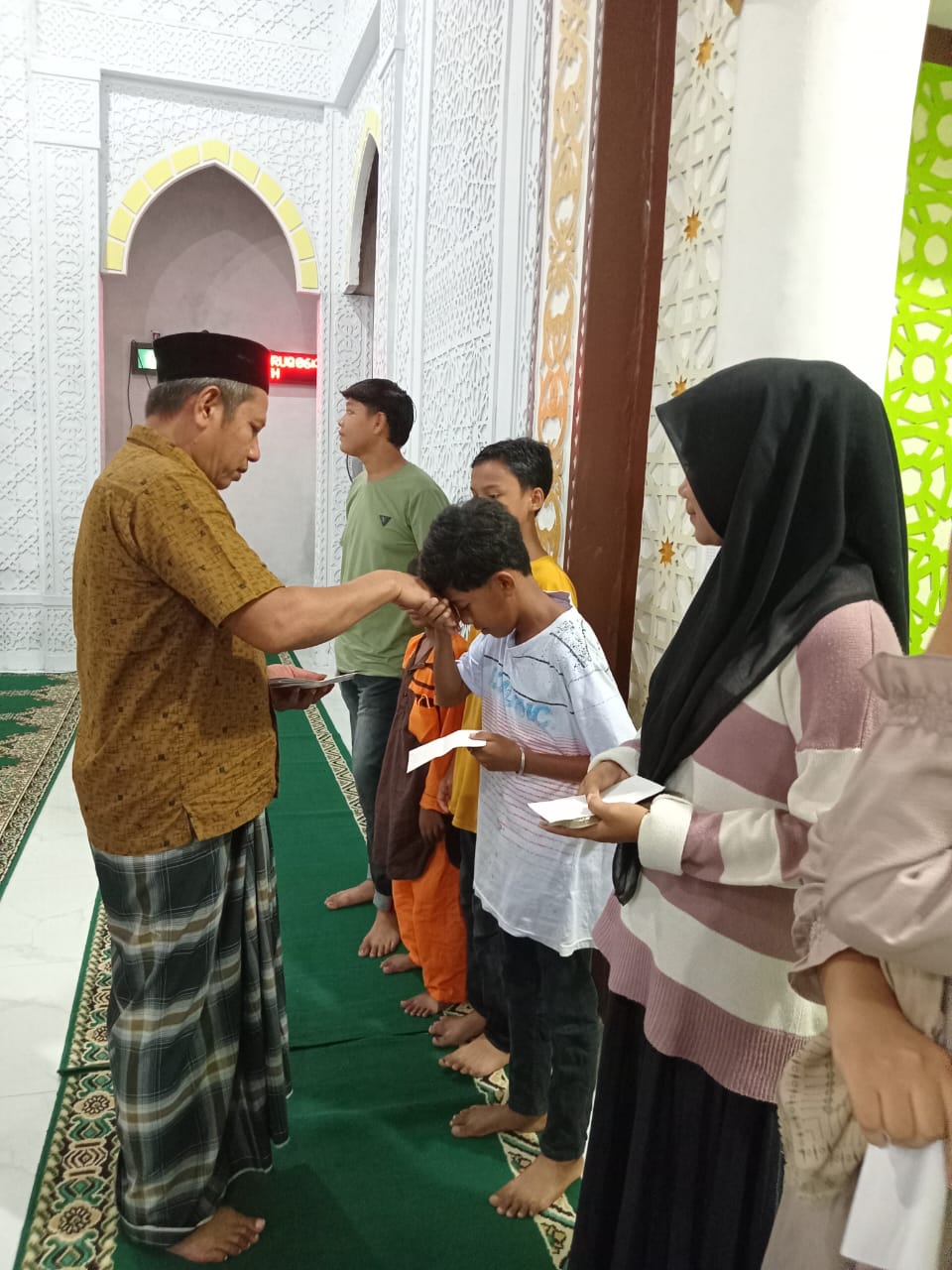 Pemuda Rekamas Ujung Tanah Abdya Bukber Santuni Yatim Duafa