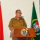 BUPATI Humbahas melalui Pj. Sekda Humbahas Chiristison Marbun menyampaikan sambutan dalam pembukaan bimbingan teknis (Bimtek) Penerapan e-kinerja BKN dan Peningkatan Indeks Profesional (IP) ASN. Waspada/Ist