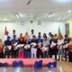 SEBAGIAN penerima bantuan beras poto bersama Kepala Kantor Kementerian Agama Kota Medan Dr.H. Impun Siregar, MA dan jajarannya. Waspada/ist