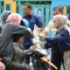 Srikandi PLN UP3 Lubuk Pakam membagikan takjil dan brosur program "Listrik di Bulan Berkah" di depan kantor PLN UP3 Lubuk Pakam.