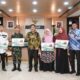 Pj Gubsu Serahkan Hadiah Umrah Kepada Pemenang MTQ ASN, Non ASN Dan Lintas lnstansi