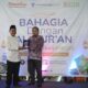 JNE menerima penghargaan Program 1 Juta Alquran. Waspada/ist