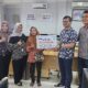 Penyerahan klaim asuransi Davestera senilai Rp319 juta kepada ahli waris Alm Yahya Surbakti, oleh Branch Office Head BRI BO Tanjungbalai, Heldin Suranta Tarigan, didampingi BFA BRILife Sutria. Waspada/Ist