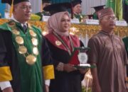 Muharrani, Wisudawati Terbaik Magister Hukum Keluarga Islam IAIN Langsa