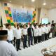 Ketua PPIH yang juga Kakanwil Kemenag Aceh Azhari melantik 140 PPPIH digedung Asrama Haji Banda Aceh, Senin (20/05/24).(Waspada/T.Mansursyah)