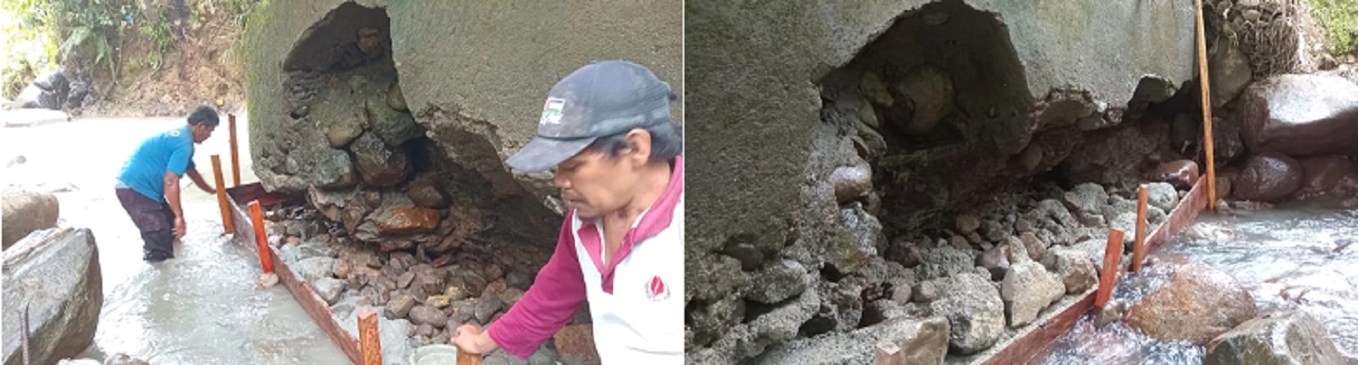 Sejumlah pekerja dari PT TPL saat melakukan perbaikan Jembatan penghubung Desa Situmbaga dengan Kota Sipirok.(Waspada/ist)