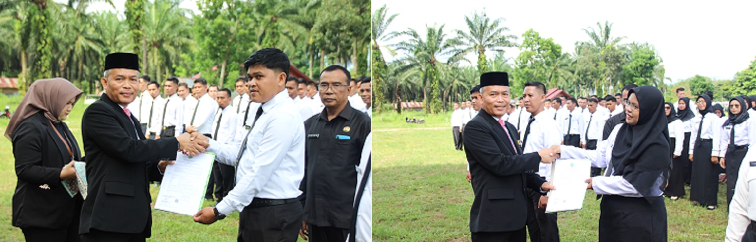 Pj. Bupati Padang Lawas, Dr Edy Junaedi Harahap melalui Sekda Arpan Nasution menyerahkan SK P3K kepada 135 guru usai upacara peringatan Hari Pendidikan Nasional tahun 2024.(Waspada/Ist)