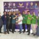 HM. Ali Yusuf Siregar saat menerima berkas formulir pendaftaran Misnan Aljawi. (Waspada/ist)
