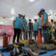 General Manager PLN UID Sumatera Utara, Saleh Siswanto didamping Manager PLN UP3 Nias, Revi Aldrian melakukan cek peralatan yang digunakan dalam menjaga pasokan listrik kejuaraan World Surf League Qualifying Series (QS) 5000 Nias Pro 2024 dan Asian Surfing Competition (ASC), Jumat (7/6).