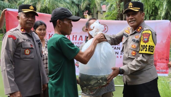 Dukung Ketahanan Pangan, Kapolres P.Siantar Tebar 1.000 Benih Ikan Nila