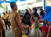 Pj Bupati Tinjau Pasar Murah Di PST