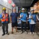 Foto bersama petugas PLN UP3 Pematang Siantar dengan Arifin pemilik kendaraan listrik di Kabupaten Simalungun, Sumatera Utara, Selasa (16/7).