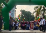 Ribuan Peserta Ramaikan Jalan Sehat Peluncuran Pilkada 2024