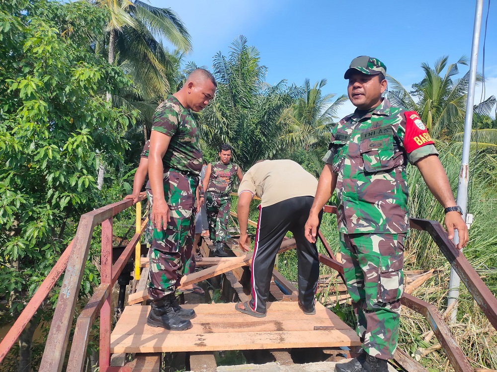 TNI AD Renovasi Jembatan Akses Sentral Pertanian TNI AD Renovasi Jembatan Akses Sentral Pertanian