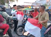 Sambut HUT Kemerdekaan RI, PKB Kota Medan Bagikan Bendera Merah Putih ke Masyarakat