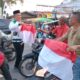 Sambut HUT Kemerdekaan RI, PKB Kota Medan Bagikan Bendera Merah Putih ke Masyarakat