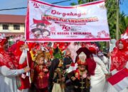Peserta karnaval dalam rangka HUT ke-79 RI di Aceh Barat, Jumat (16/8).(Waspada/Muji Burrahman)