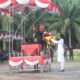 Memakai busana adat Karo, Bupati Sergai Darma Wijaya menjadi Irup HUT ke-79 RI. Waspada/ist