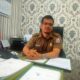 Kabid Pengadaan, Pemberhentian & Informasi Badan Kepegawaian Pengembangan Sumber Daya Manusia Kabupaten Deliserdang M.Hendri, S.Kom, MSi, memberi keterangan di ruang kerjanya, Selasa (20/8). (Waspada/Khairul K Siregar/B)