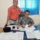 KEPALA Desa (Kades) Marindal I, Aridanto (kanan) didampingi Ketua DPD Jaringan Informasi Nasional Sumut Hermanto Simanjuntak. Waspada/Ist