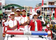 Pj Bupati Agara Sambut Antusias Kirab Api PON XXI Aceh-Sumut