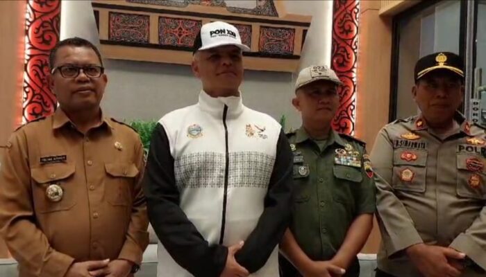 Api Obor PON XXI Diarak Keliling Kota Balige