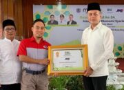 JNE Medan Raih Penghargaan Perusahaan Peduli Ekonomi Syariah