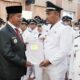 Bupati Simalungun Radiapoh H Sinaga saat mengukuhkan 383 Pangulu dalam jabatan 8 tahun di Balei Harungguan Djabanten Damanik Kantor Bupati Simalungun, Pamatangraya, Selasa (17/9).(Waspada/ist).
