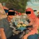 Foto Almh SN saat masih hidup memegang buket bunga. Waspada/Ist