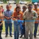 Senior Manager Community PT AR, Christine Pepah (tengah) didampingi Camat Batang Toru, Mara Tinggi Siregar (2 kanan) dan Sekretaris Dinas Perindag Tapsel, Hotmatua Rambe menggunting pita launching Bagas Silua di pintu masuk Tambang Emas Batangtoru, Keluarahan Aek Pining, Kecamatan Batang Toru, Tapsel, Sabtu, (28/9). Waspada/Mohot Lubis.
