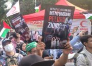 Peringatan Satu Tahun Genosida Israel Di Palestina, Viral Gerakan “Lanjutkan Boikot”