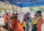 Komunitas Di Medan Bagi Pakaian Gratis Ke Petugas Kebersihan Saat Car Free Day