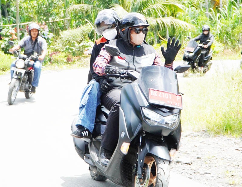 Pj Bupati Langkat Pantau Desa Dengan Sepeda Motor
