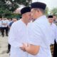 Calon Bupati Langkat Syah Afandin menyambut kedatangan Calon Gubsu Bobby Nasution di Pondok Pesantren Ulumul Qur’an di Stabat, Jumat (25/10). Waspada/Ist