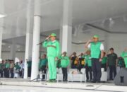 Pj Gubsu Pimpin Pengibaran Bendera Kontingen PON XXI Sumut