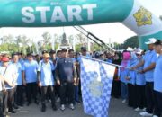 Pj Gubernur Lepas Jalan Santai Meriahkan Milad Ke-63 USK