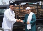 Haul Ke-101 Tuan Guru Babussalam, Pj Bupati Langkat Serahkan Bantuan