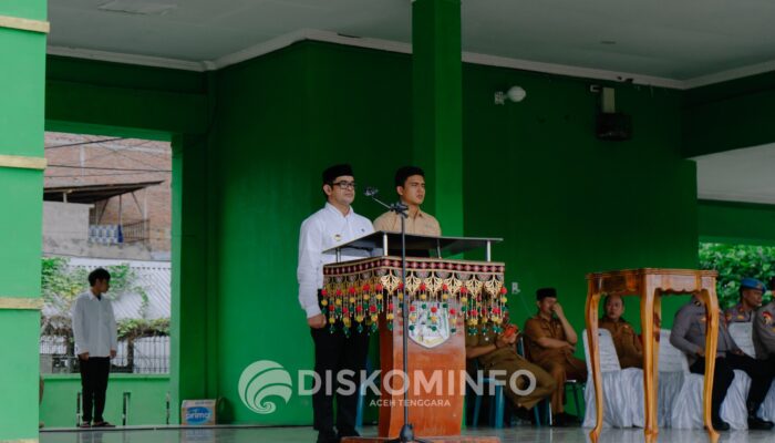 Pj Bupati Agara Serahkan Satlinmas PAM TPS