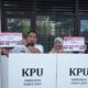 Pj Bupati Aceh Besar Dan Istri Nyoblos Di TPS 001 Gampong Jantho Makmur