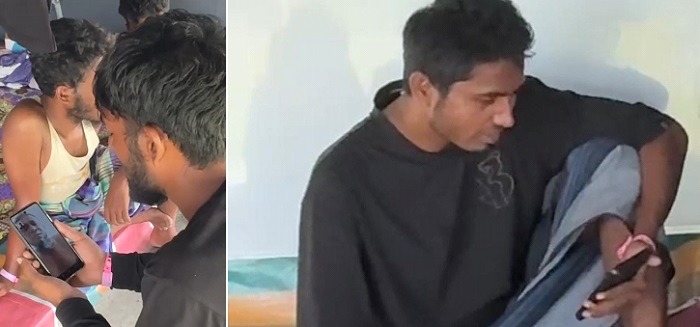 Etnis Rohingya memegang handphone (HP) di tempat penampungan di Lapangan Sepakbola Gampong Seuneubok Rawang, Peureulak Timur, Aceh Timur, Jumat (1/11). Waspada/Muhammad Ishak