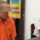 Tersangka pelaku pencabulan terhadap anak tirinya saat menjalani pemeriksaan di Polres Asahan. Waspada/Sapriadi
